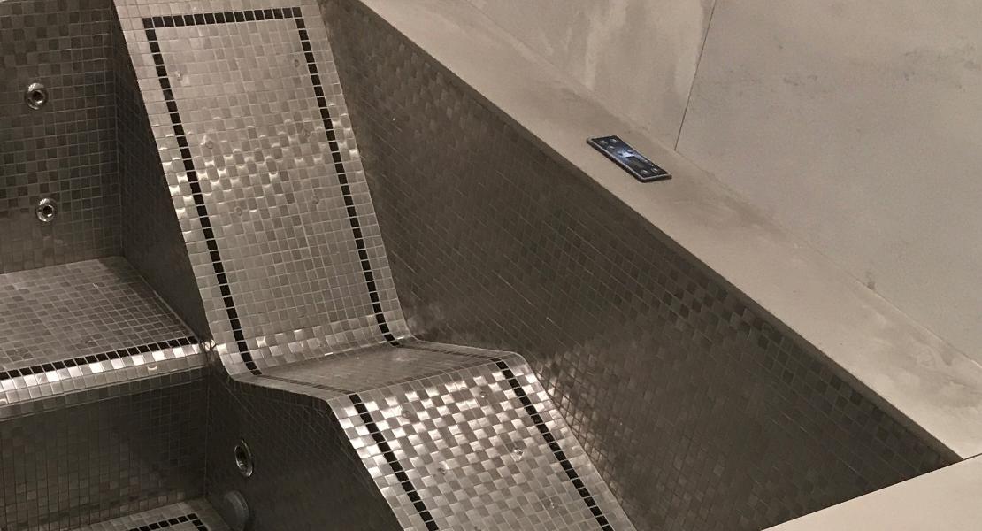 Stunning metal tile below ground spa